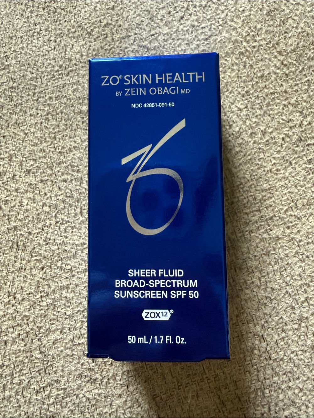 Sheer Fluid Broad-Spectrum Sunscreen SPF 50 – Blue